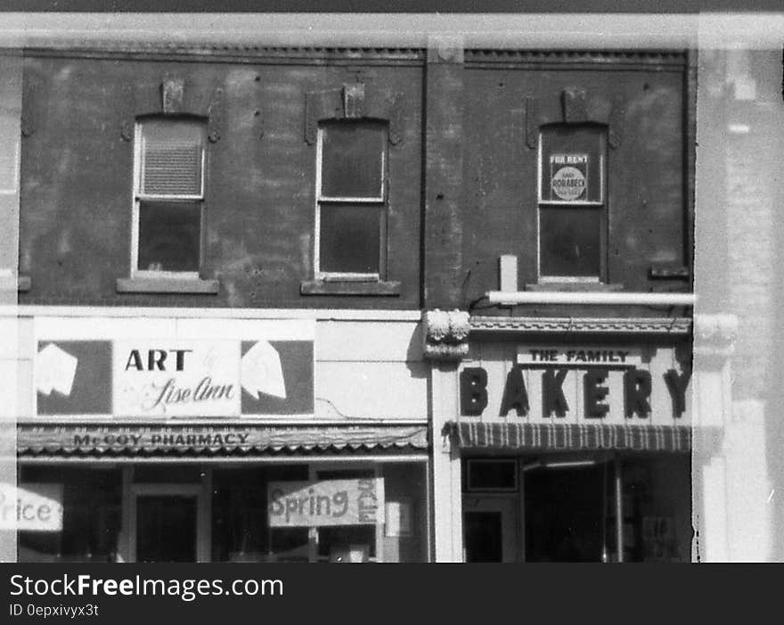 Signs over storefronts in downtown Belleville circa 1970 in black and white. Signs over storefronts in downtown Belleville circa 1970 in black and white.