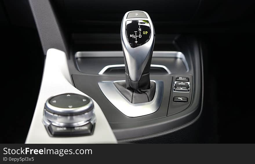 Close up of gear shift in luxury automobile. Close up of gear shift in luxury automobile.