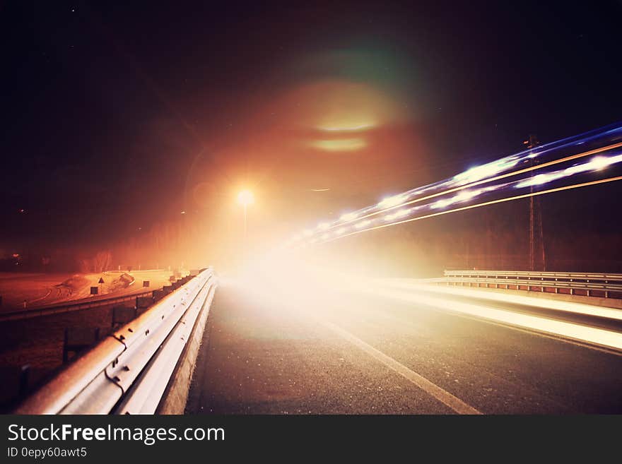 A long exposure of a highway street at night. A long exposure of a highway street at night.