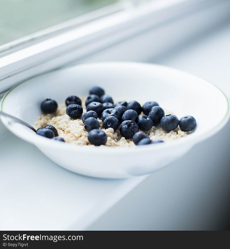 Blackberry on White Ceramic Bowl