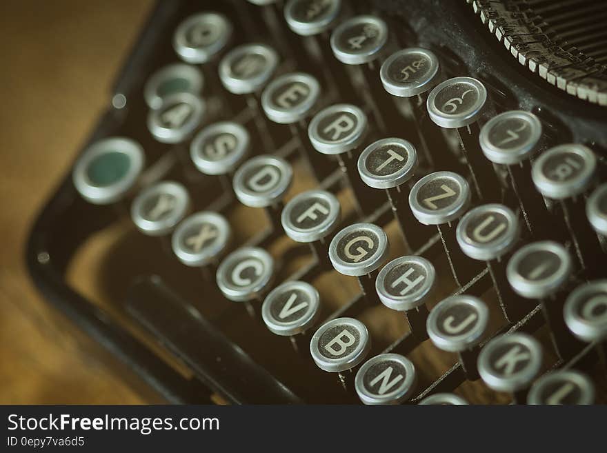 Shallow Photoghrapy of Black and Gray Type Writer Keys