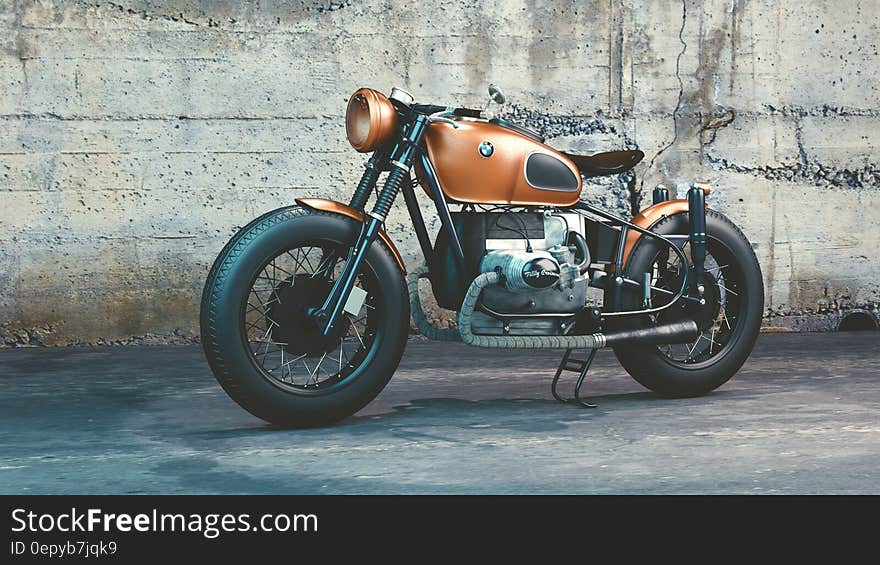 Orange and Black Bmw Motorcycle Before Concrete Wall