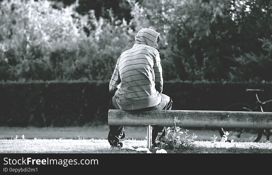 Gray-scale Photo of Person Wearing Stripe Hoodie