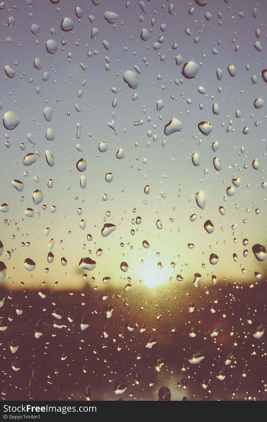 Water Drops on Glass during Daytime