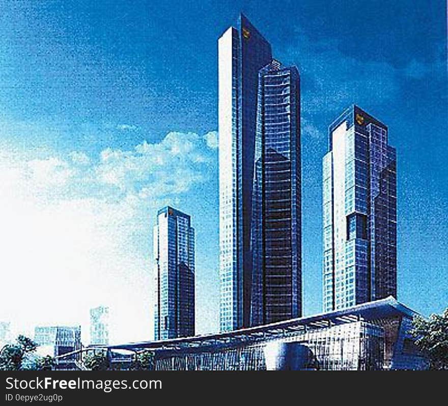 Facade of modern high rise buildings with blue filter effects. Facade of modern high rise buildings with blue filter effects.