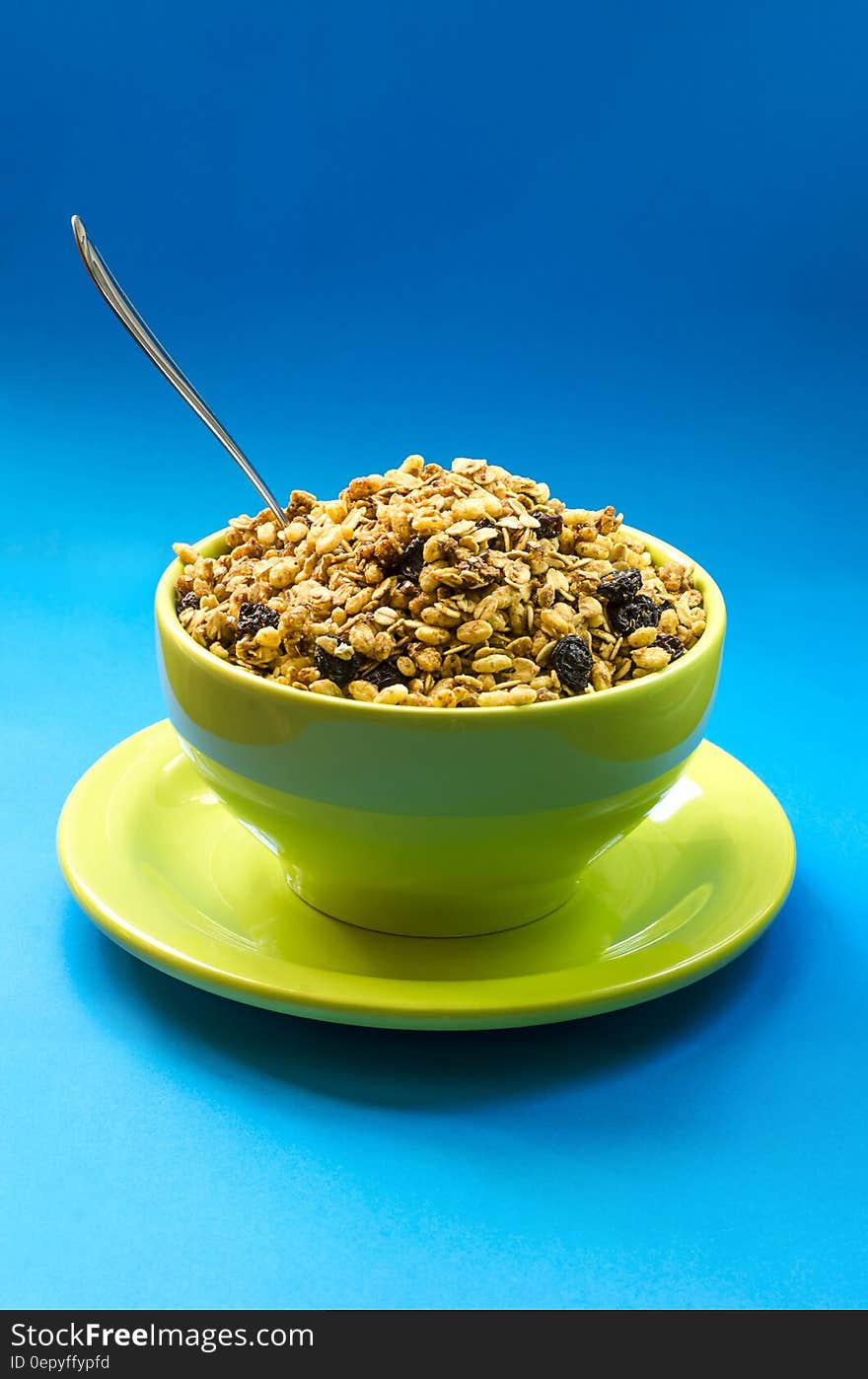 Seeds on Green Ceramic Bowl and Saucer