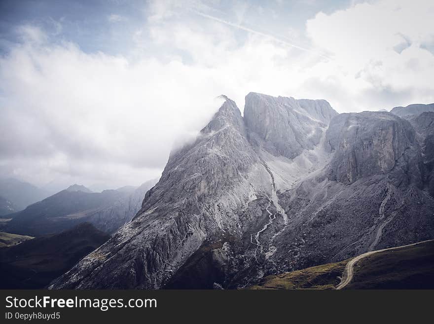 Gray Mountains Under Cloudy Sky