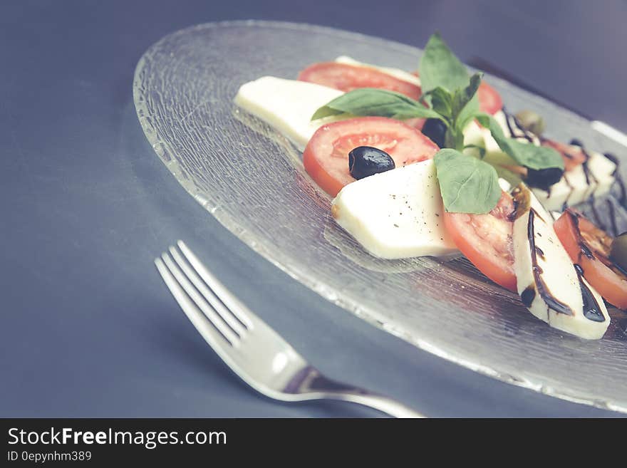 Assorted Dish on Clear Glass Plate