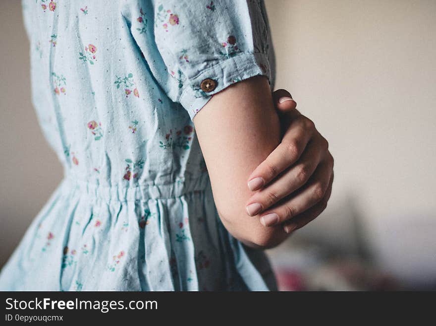 Tilt Photography of Female Wearing Gray Red Green Floral Short Sleeve Dress