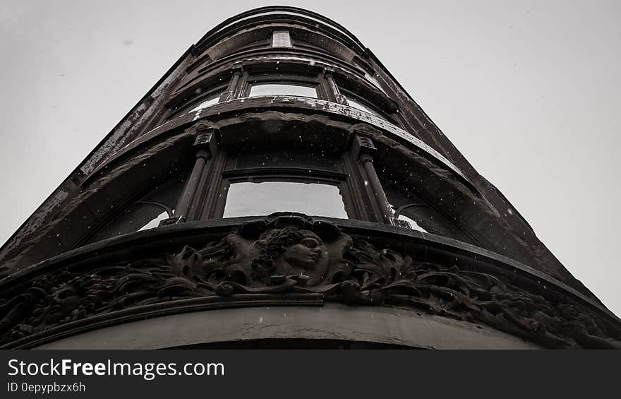 Facade of a historic building from a low angle. Facade of a historic building from a low angle.