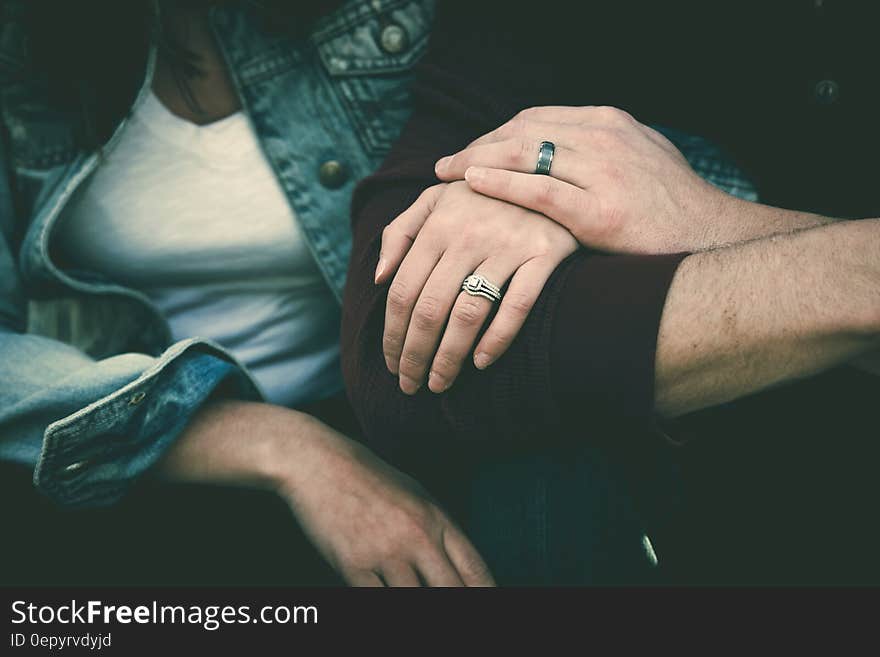 Man and Woman Couple Wearing Their Silver Couple Bond Ring