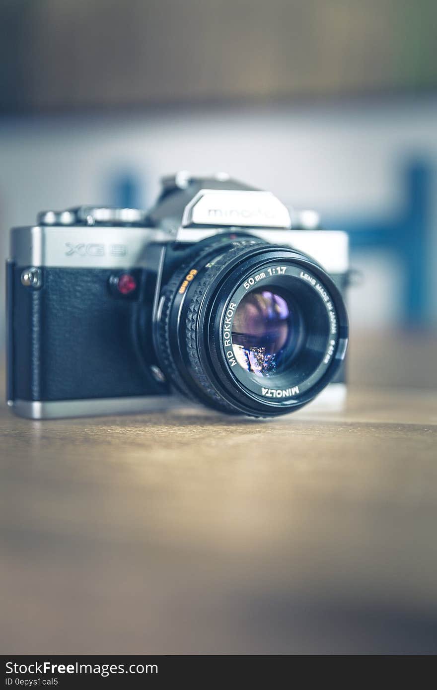 Shallow Focus Photography of Black and Silver Slr Camera