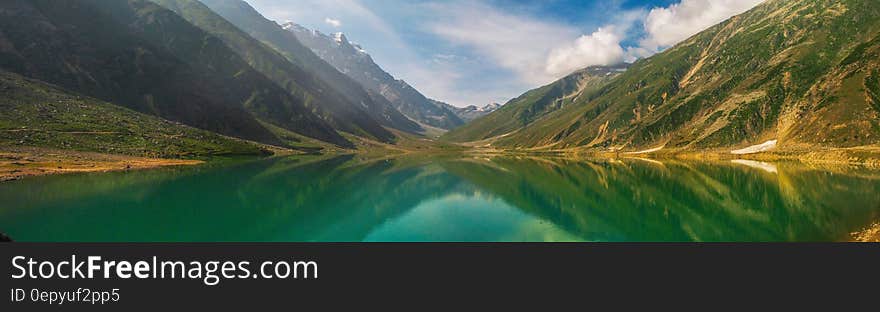 Green Lake Surrounded by Mountain