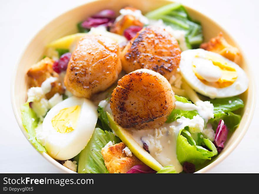 White Eggs and Vegetables in White Ceramic Bowl