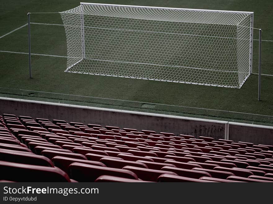 Stadium Seats Near White Soccer Goal