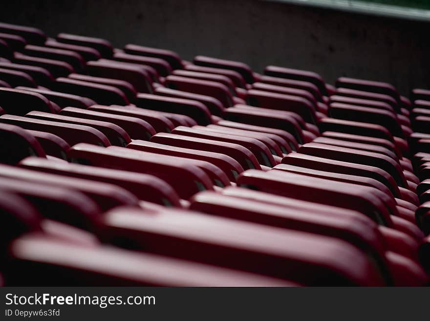 Selective Focus Photograph of Red Oval Shape Equipment