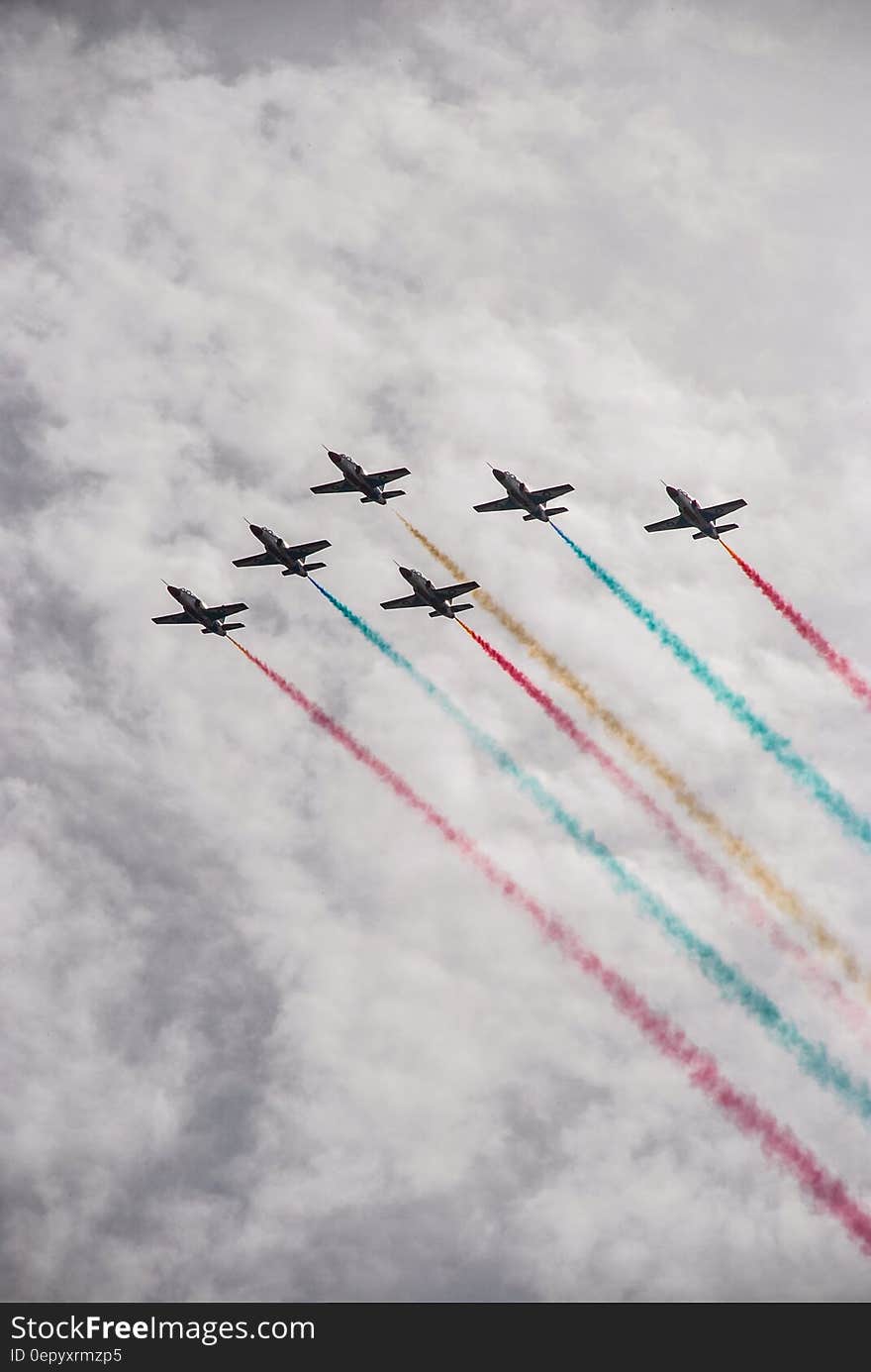 6 Jets Parading Toward Clouds