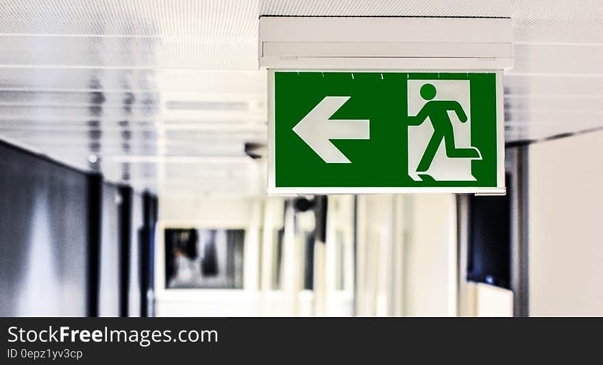 Green and White Male Gender Rest Room Signage