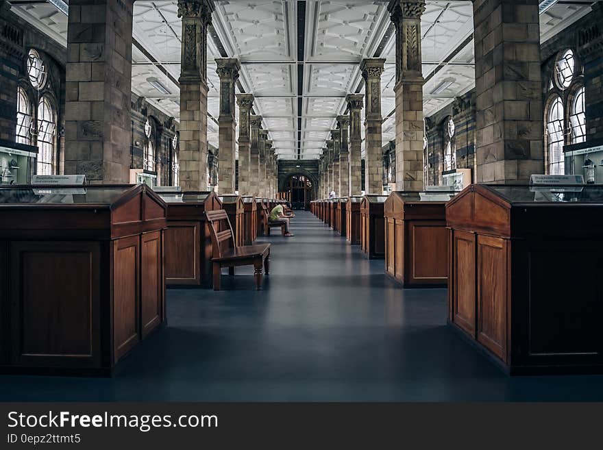 A hallway inside a London museum and exhibits aside. A hallway inside a London museum and exhibits aside.