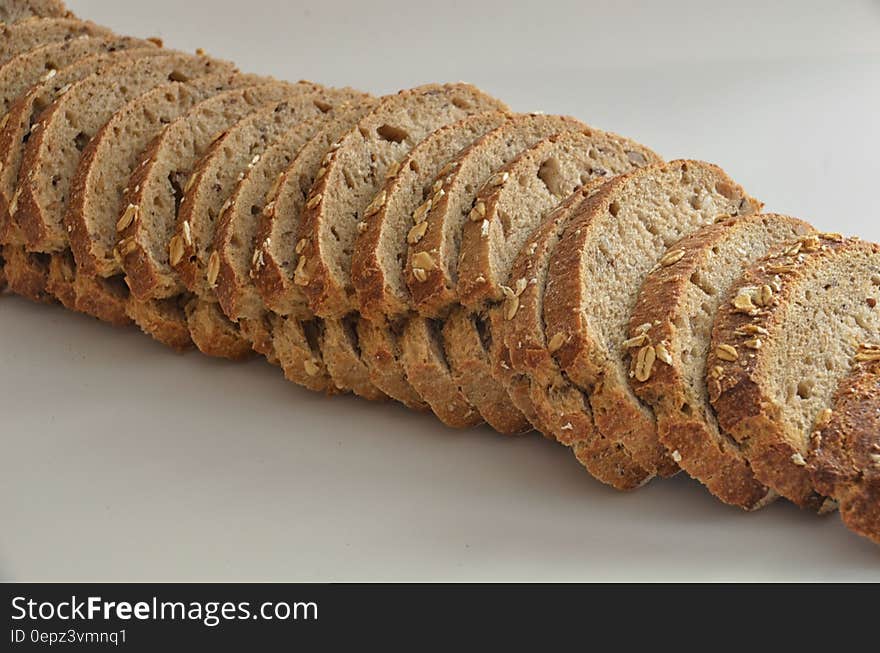 Close up of slices of rye bread on countertop. Close up of slices of rye bread on countertop.