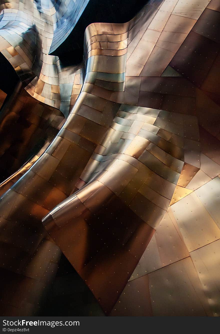 Close up of curved metallic abstract architecture.