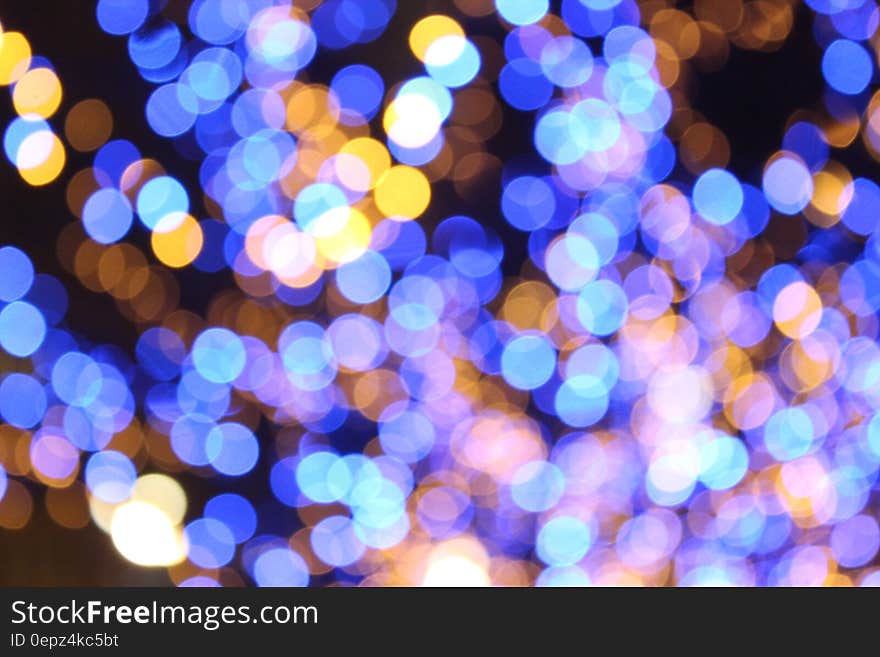 Abstract bokeh light background in blue and yellow. Abstract bokeh light background in blue and yellow.