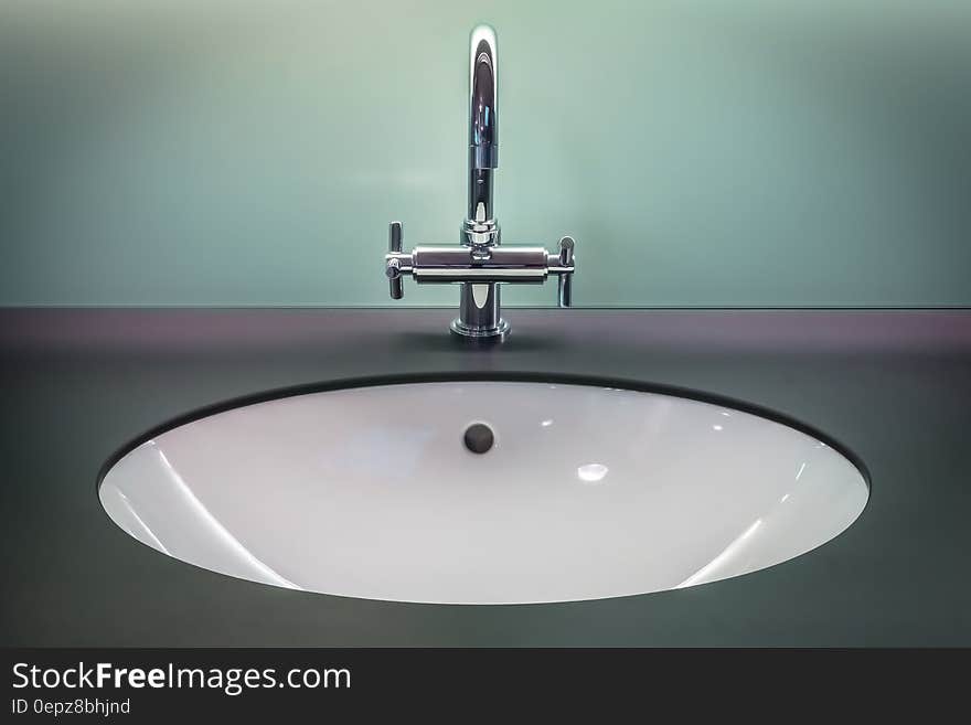 Black and White Vanity Top With Stainless Steel Faucet