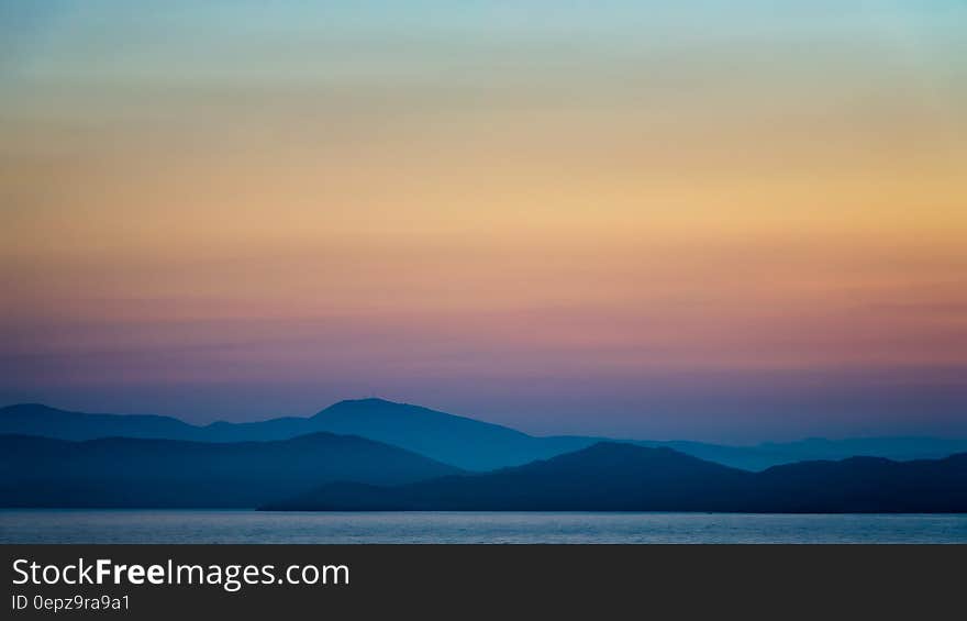 Silhouette of Mountains during Golden Hour