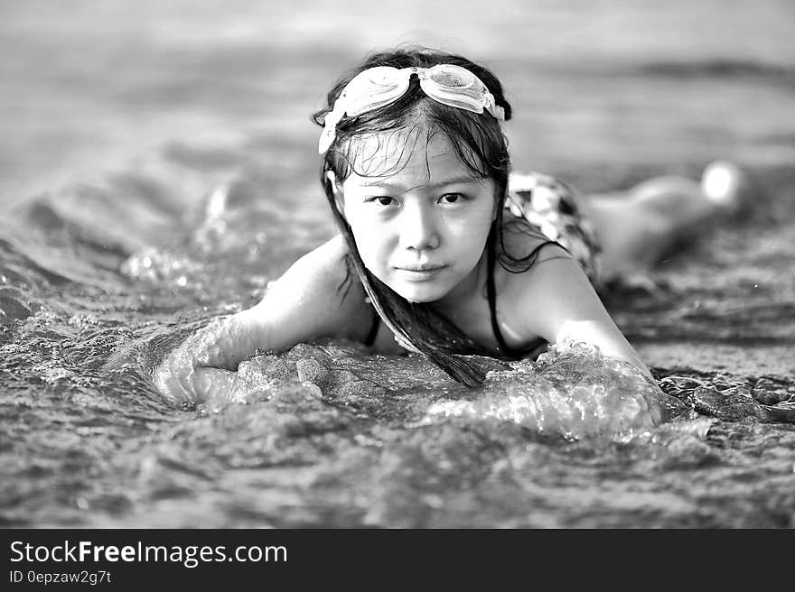 Girl Wearing Goggles on Beach in Black and White