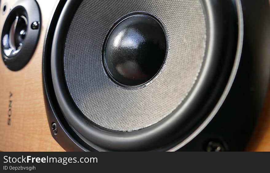 Closed Up Photography of Brown Wooden Framed Sony Speaker