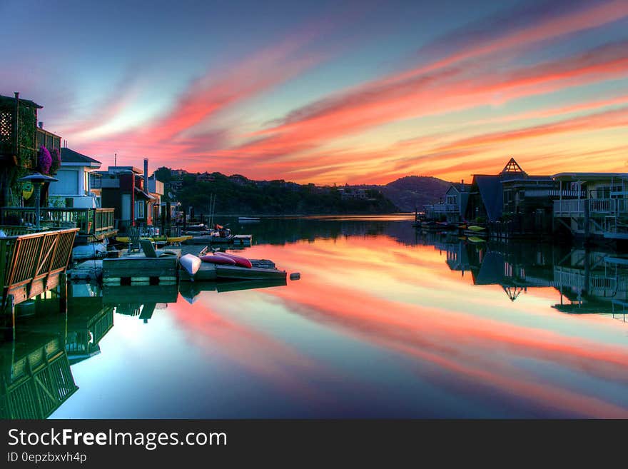 Landscape Photography of Canal and Houses