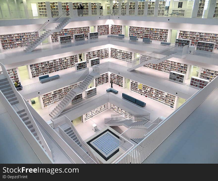 White Concrete Tall Building With Books