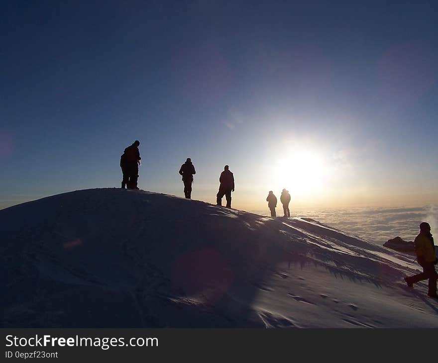 People Hiking on Mountain during Daytime