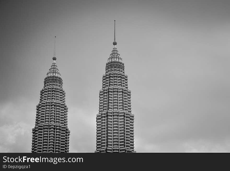 Gray Scale Photo of 2 High Rise Building