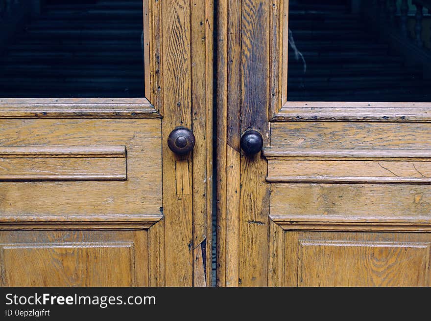 Closeup of closed broken wooden door.