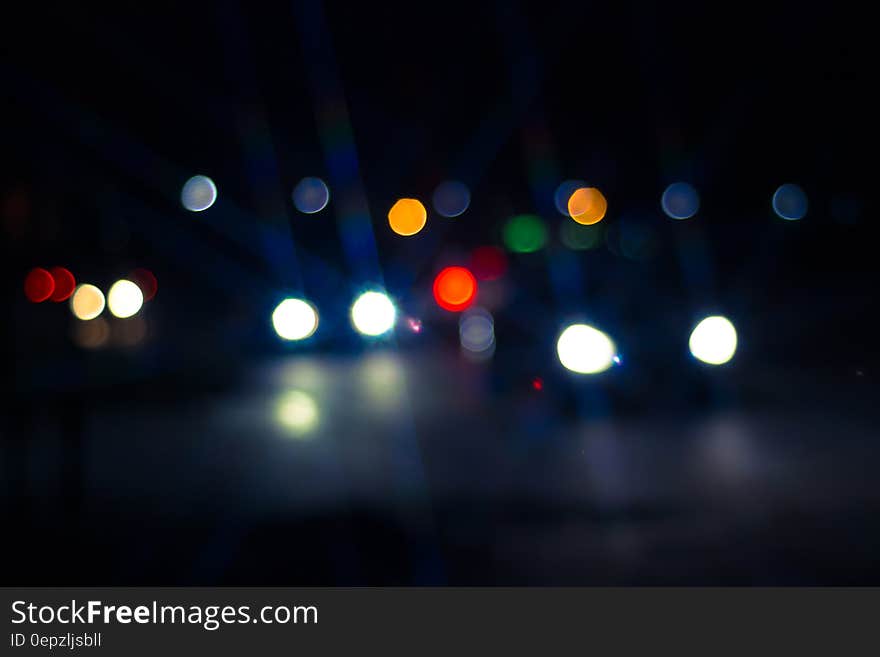 Photo of Car and Street Lights during Night Ime