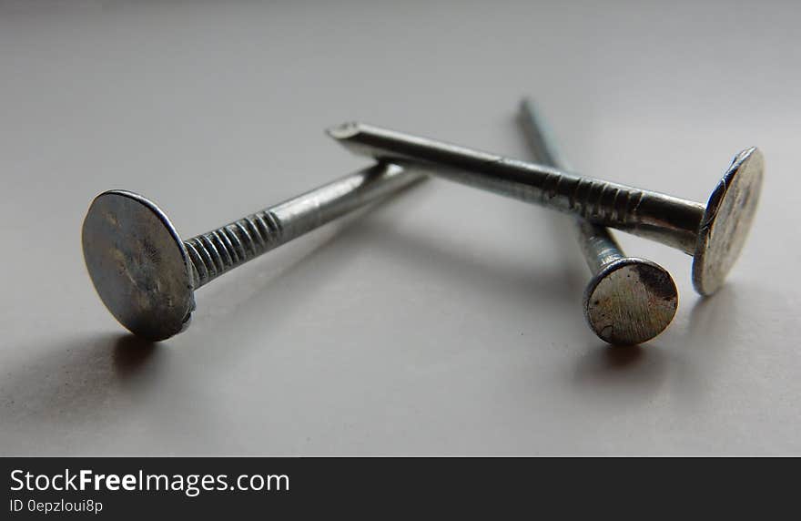 3 Flat Head Nails Close Up Photography