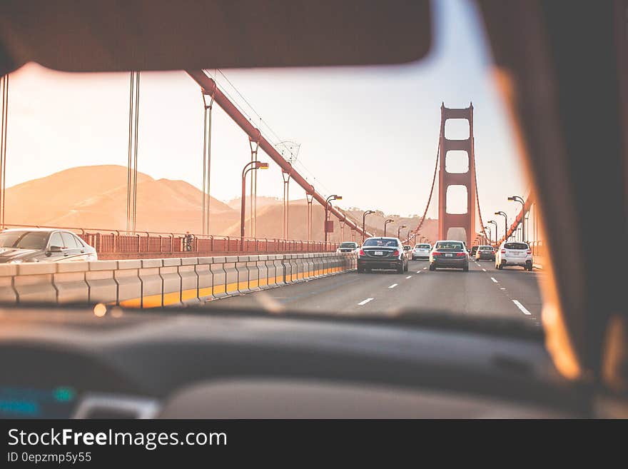 Black Cars on Golden Gate Bridge at Daytime