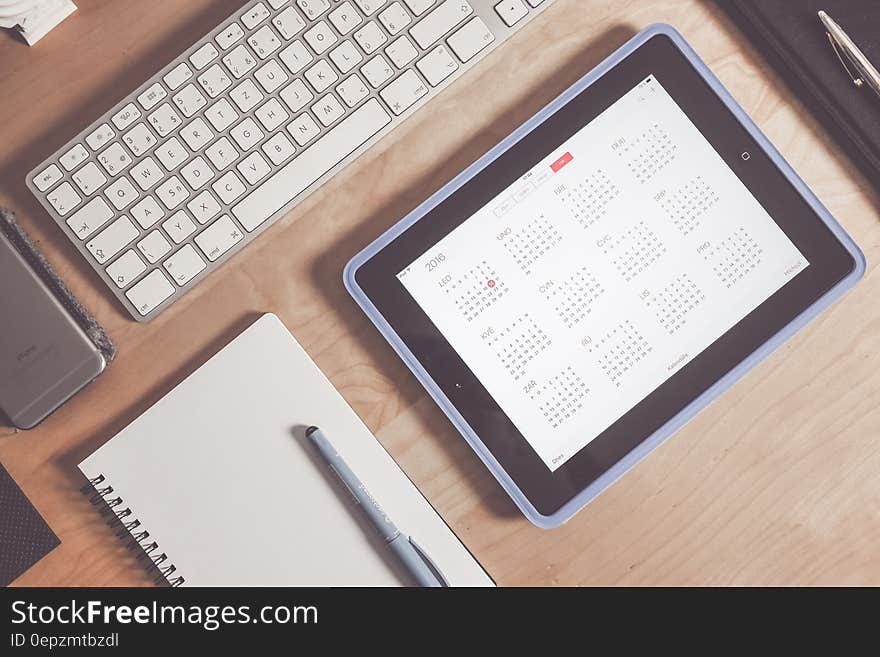 Grey Apple Keyboard and Grey Ipad