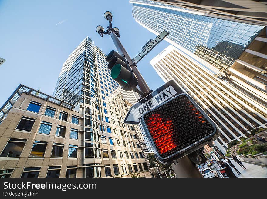 Front Street One Way Sign and No Walking Sign