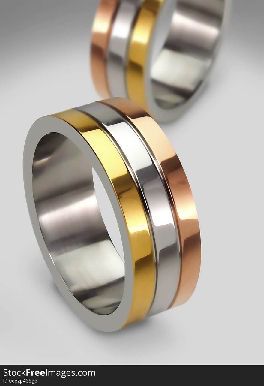 Close up on metal bands on wedding rings. Close up on metal bands on wedding rings.