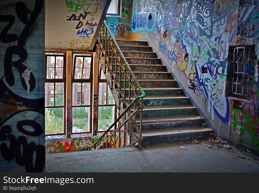 Graffiti Wall With Wrought Iron Donwstairs