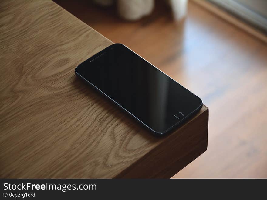 Black Android Smartphone on Corner Table