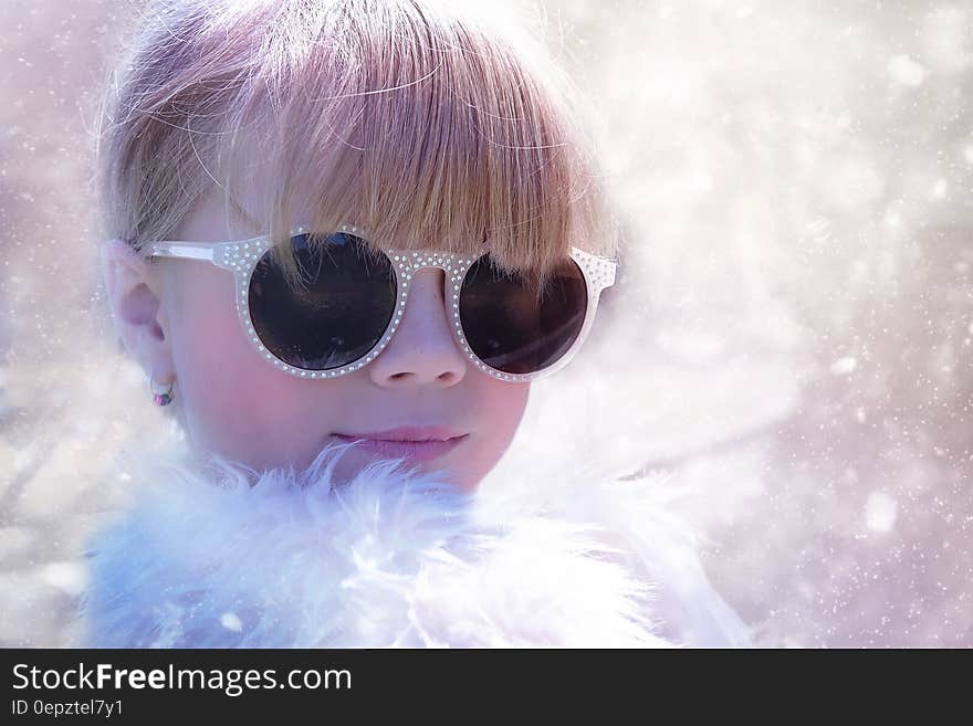 Woman With Sunglasses in White Fur Shirt