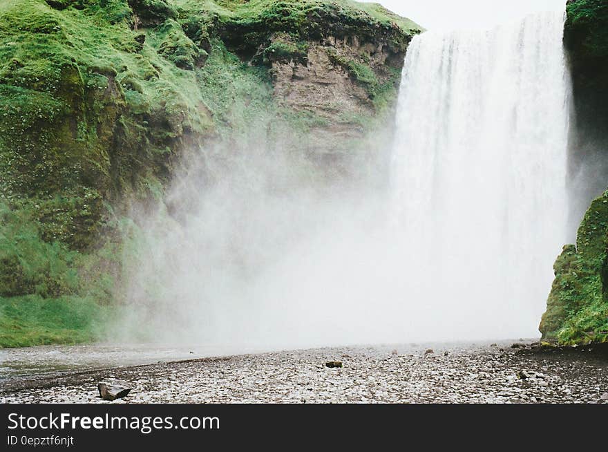 Mist from waterfall in rural river. Mist from waterfall in rural river.