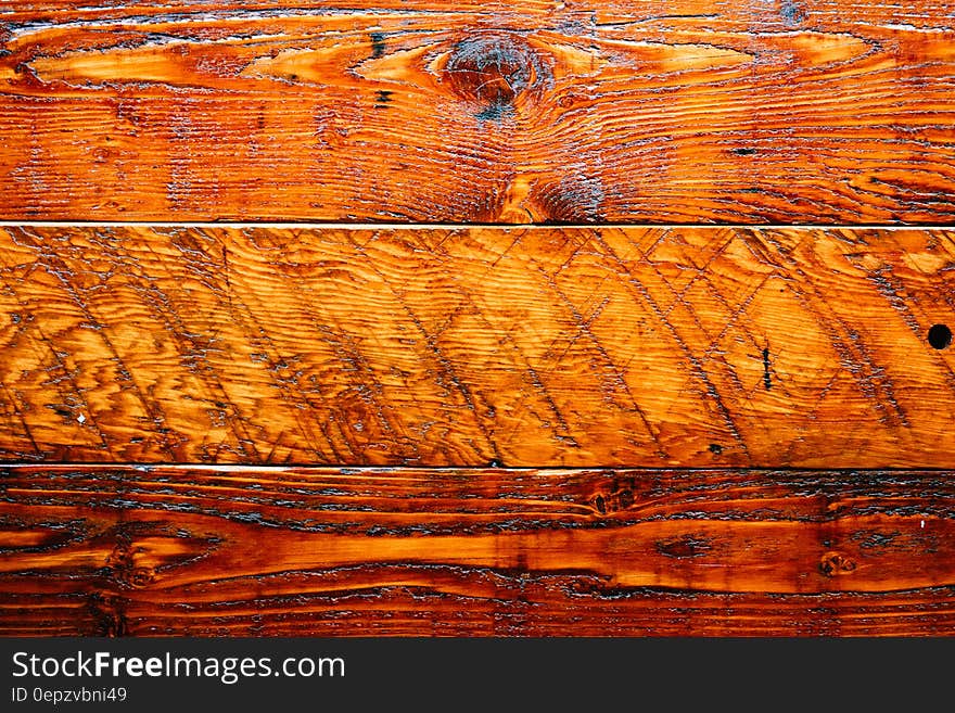 Background of brown textured wood in three different patterns. Background of brown textured wood in three different patterns.