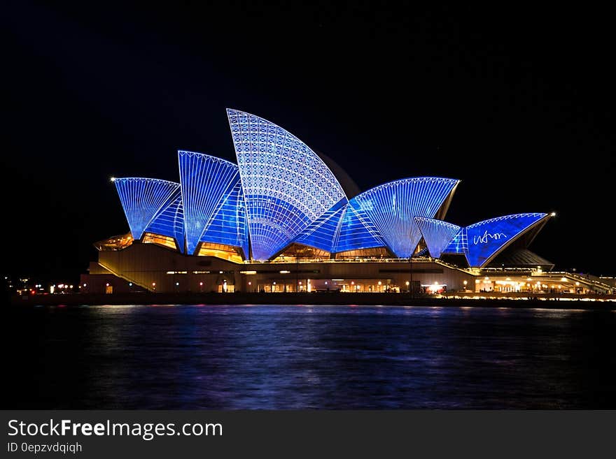 Blue Lighted Sydney Opera House during Nighttime