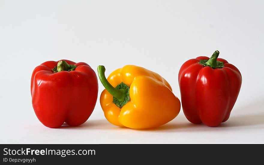 Yellow Bell Pepper Between 2 Red Bell Pepper