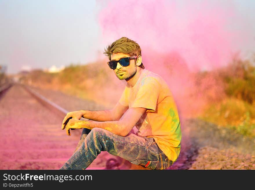 Man in T-Shirt and Jeans and Sunglasses Color Power