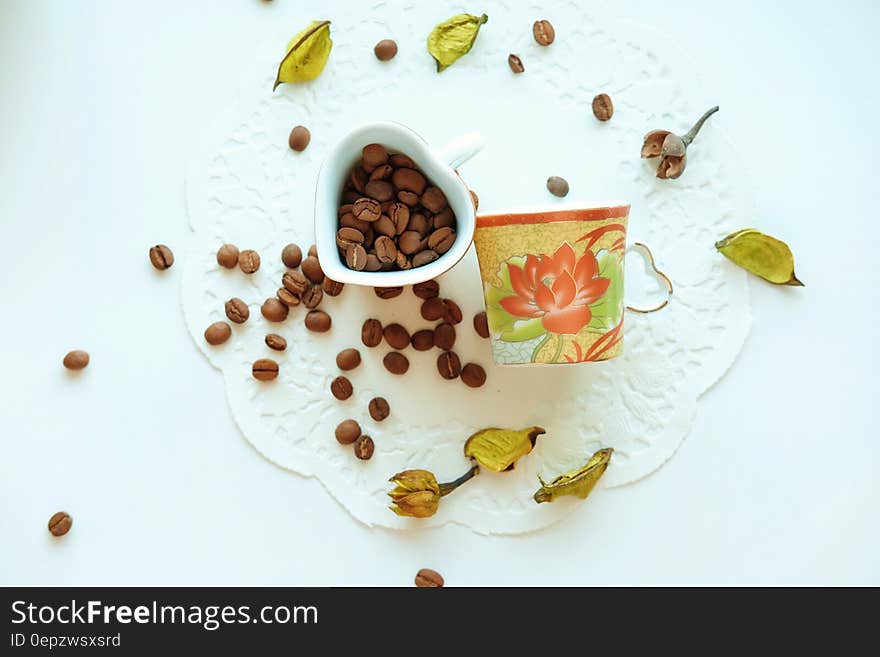 Brown Coffee Beans on White Ceramic Container